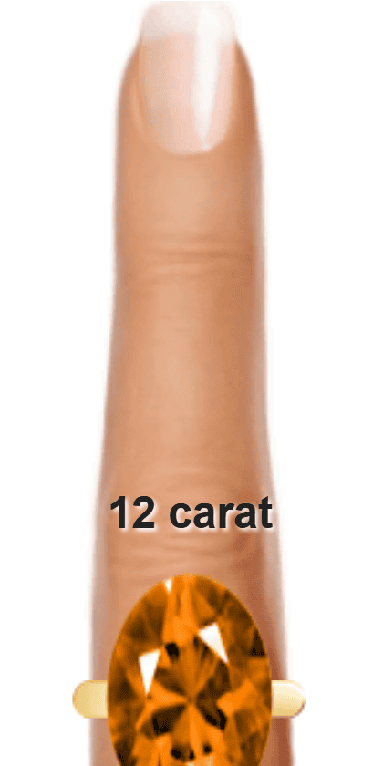 Orange 12 carat oval-cut Andesine on a ring and finger.